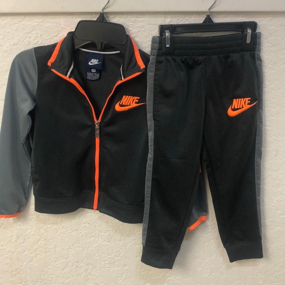 grey and orange nike tracksuit